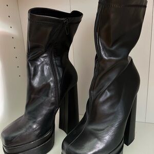 Black brat high boot
